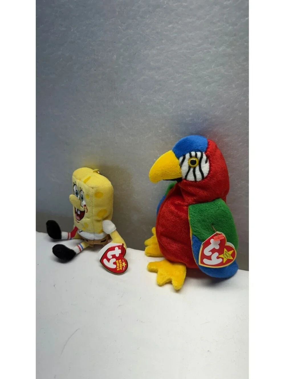 Lot of 2 Ty Beanie Babies: SpongeBob SquarePants & Jabber Parrot Plush Toys